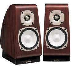 An image of a pair of speakers as an example of an output device.