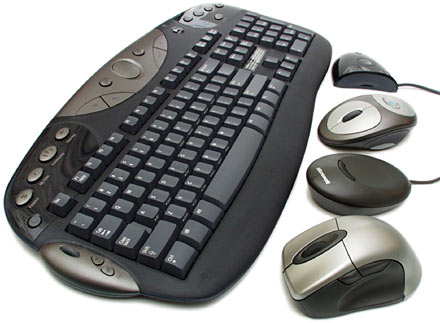 This is an image of a keyboard and several mouses