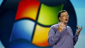 Bill Gates talking with Microsoft's icon in the Background.